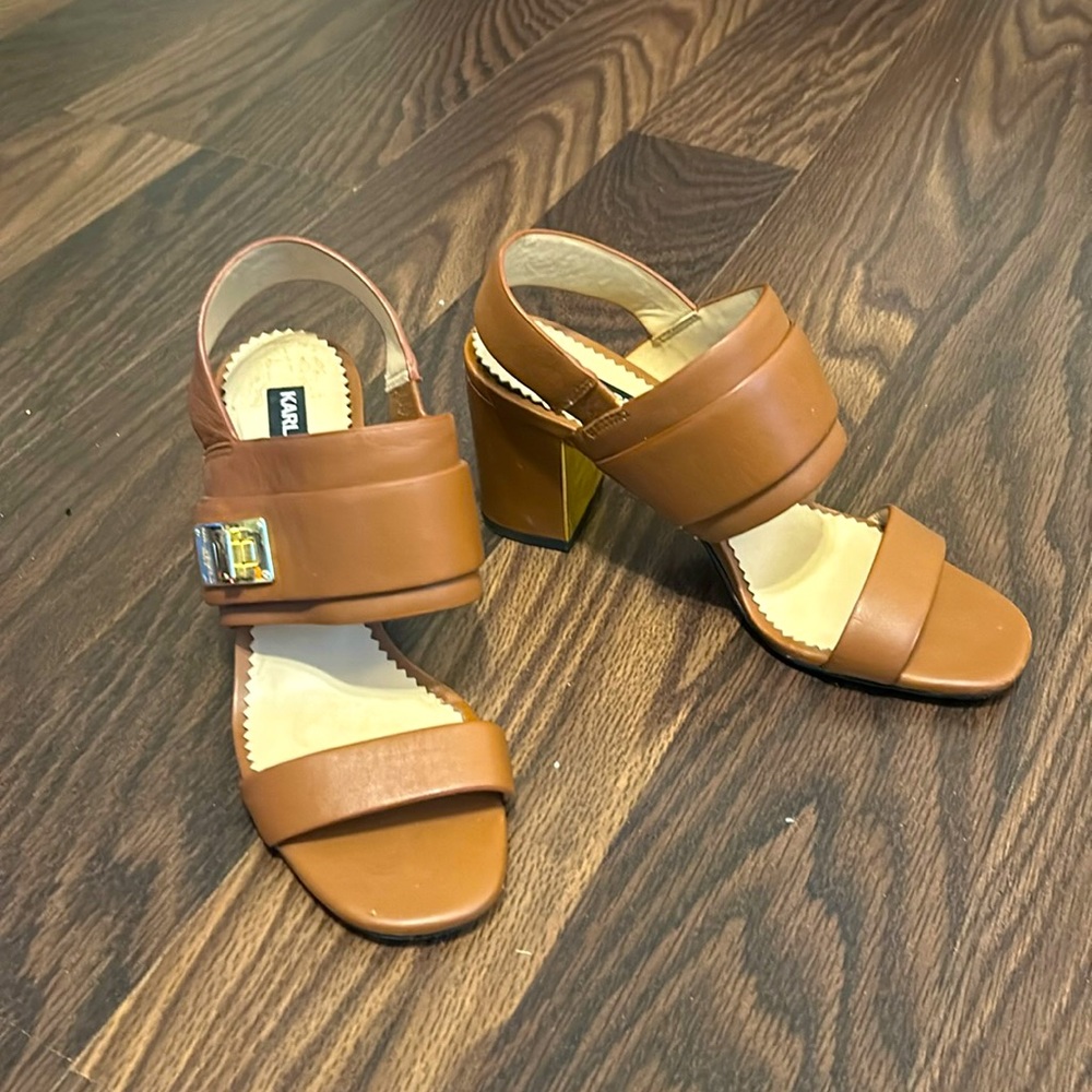 Brown leather sandal size 5.5 like new worn once.
